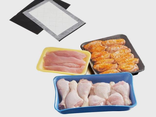 Absorbent pads for meat packaging